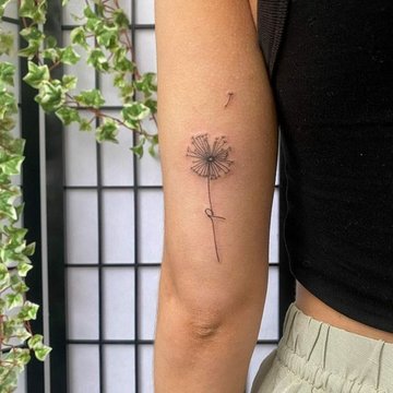 Paardenbloem tattoo