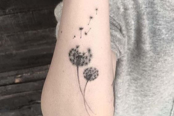 Paardenbloem tattoo