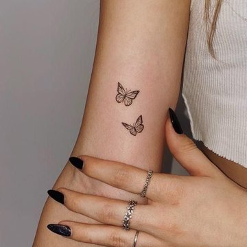 Women's arm tattoos