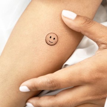 smiley tattoo