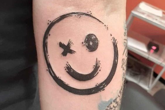 smiley tattoo