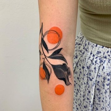 sinaasappel tattoo