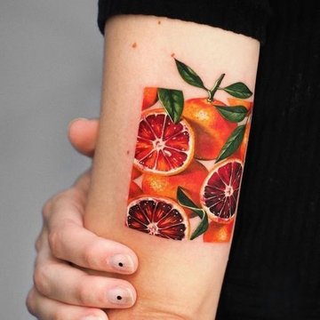 sinaasappel tattoo