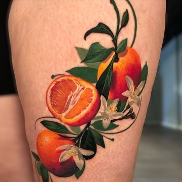 sinaasappel tattoo