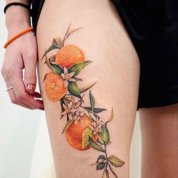 sinaasappel tattoo