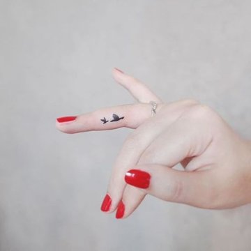 Finger tattoo
